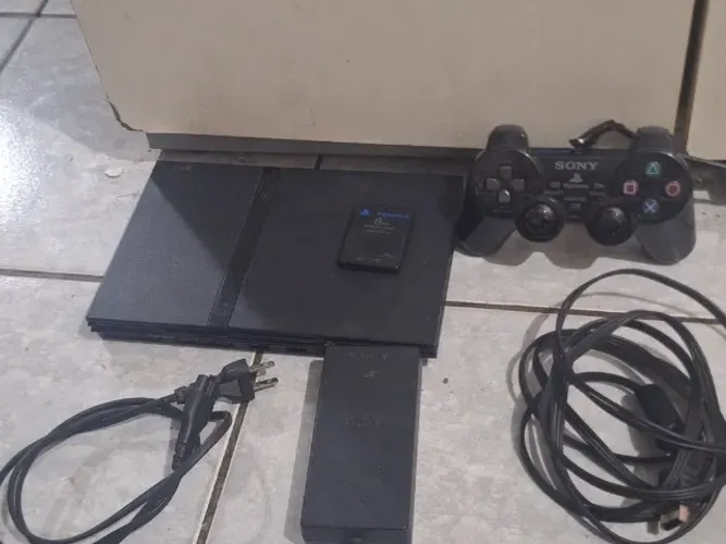 Vendo ps2 1 memory cart e um comtrole original e com todos os capos