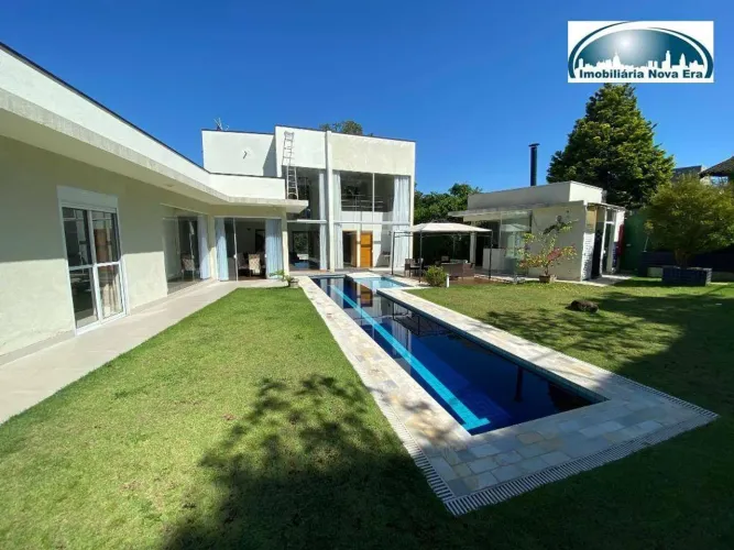Casa com 3 dormitórios para alugar, 300 m² por R$ 12.416,85/mês - Condomínio Marambaia - V