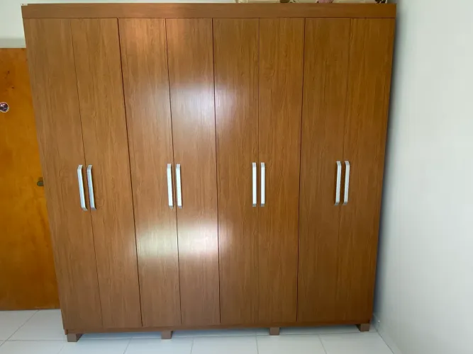 Guarda-Roupa Casal Édez Magnolia, da marca Herval, com 6 portas e estrutura em MDP.  