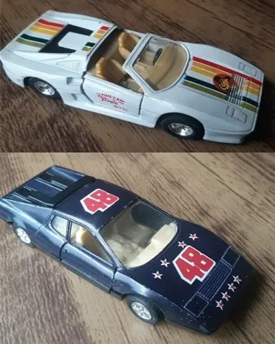 2 Carrinhos metal miniatura colecionador Ferrari F100 F505