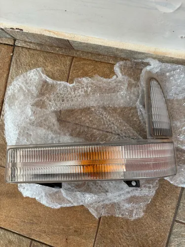 Pisca da F-250 original Cibié lado motorista 