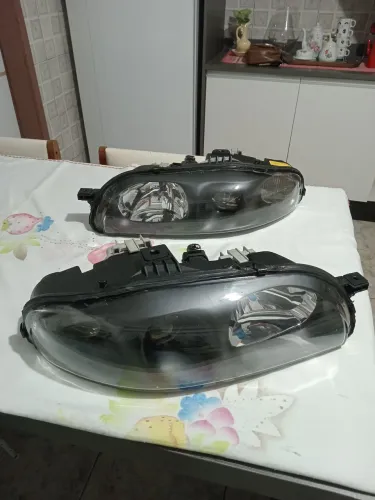 RARIDADE....FARÓIS "Máscara Negra" para FIAT Brava e Marea , Recondicionados e sem uso ! !