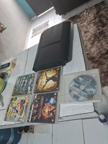 Console Sony PS3 Super Slim com 5 jogos