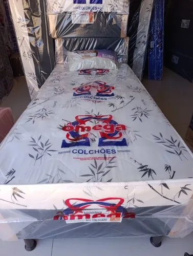 Cama box solteiro + travesseiro de brinde ?