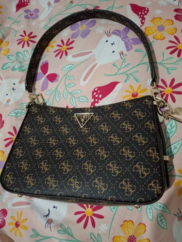 Bolsa Guess monograma pequena usada otimo estado