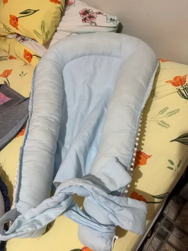 Ninho redutor de berço