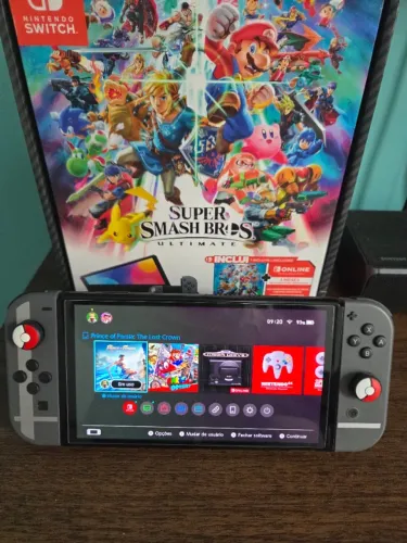Console Nintendo Switch OLED Super Smash Bros + Jogo Mario Kart 8 Deluxe