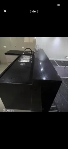 Pedra com lixeira, torneira e planejado completo