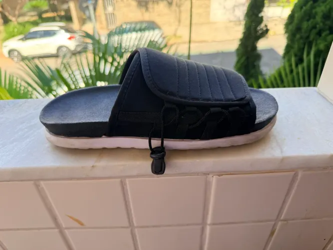 chinelo de jogador