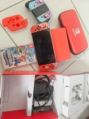 Nintendo Switch OLED Mario Red Edition - Acessórios + Mario Wonder + 128GB
