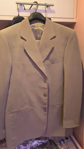 Têrno completo em tecido Plissê diferênciado , Novo!