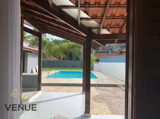 Casa com piscina no condomínio Morada da Praia - Bertioga - SP