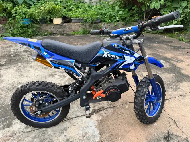 Mini moto 50cc Xtreme, zero, está como novo, comprei novo para meu filho e ele não gostou.