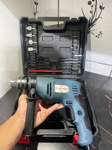 Furadeira de Impacto 750W Holtter com Maleta e Kit de Brocas