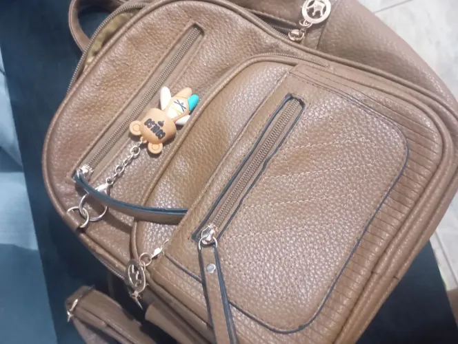 Mochila e porta cartão os 2 por 50,00