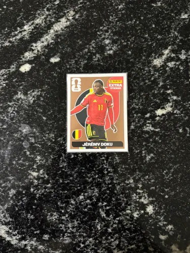 Figurinha extra panini Jérémy Doku bronze