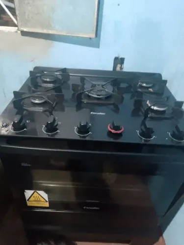 Vendendo fogão de 5 bocas semi novo motivo viagem