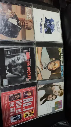 Louis Armstrong , John Lee Hooker e outros