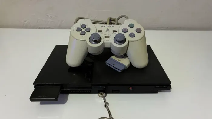 PS2 Slim com varios jogos