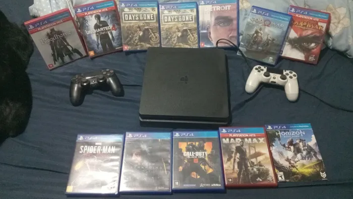 Playstation 4 semi -novo 1 tera original + 11 jogos tudo completo 