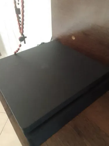 Troco ps4 com 2 controles base de carregamento e mais 3 jogos por ps5