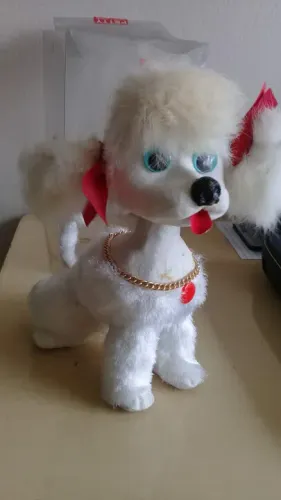 Cachorrinho antigo (anos 70) de pelúcia  com cabeça que balança 