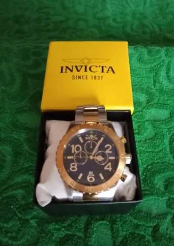 Invicta Original Specialty 50mm dourado e prateado.<br>Aço inoxidável. (40603)<br><br>R$ 1.175,00