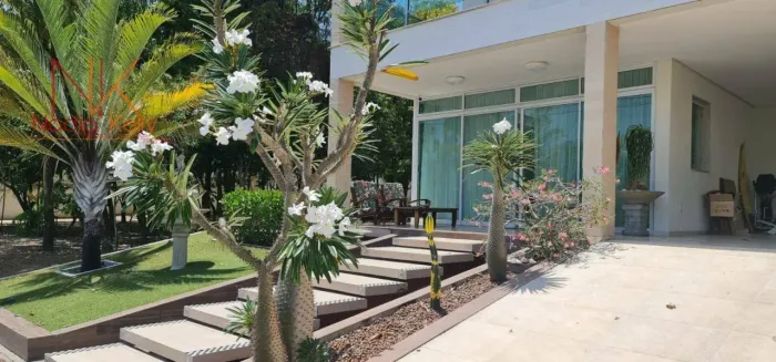 Casa em condomínio de 450m² com 5 suítes à venda por R$ 3.000.000