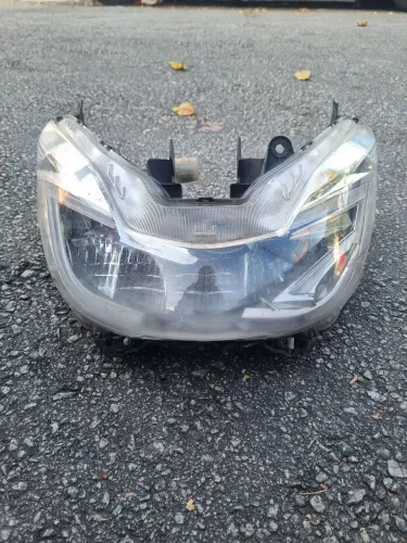 Farol compatível com modelos Honda PCX 150.