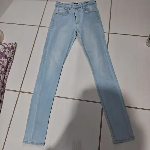 Três calças skinny 34
