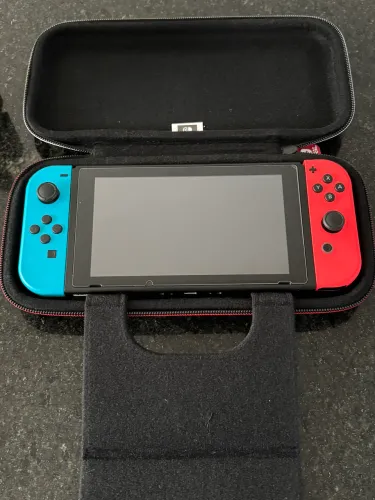 Nintendo Switch 1 com película, capa e volante