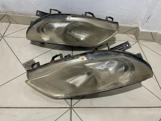Par De Faróis usados G5 2012 Wolksvagen Original com lâmpada Halogênio carro caminhonete