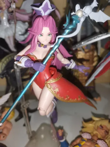 Action figure original de Angela, rica em detalhes e cores vibrantes. Perfeito para col