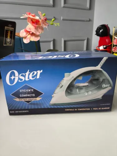Ferro de passar OSTER 220v novo