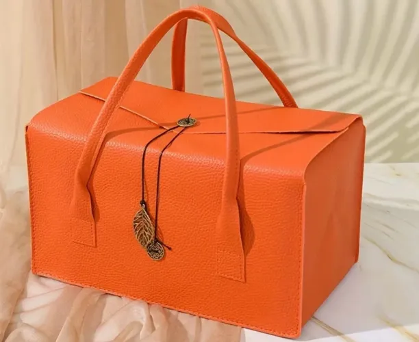 Bolsa couro laranja estilo hermes 
