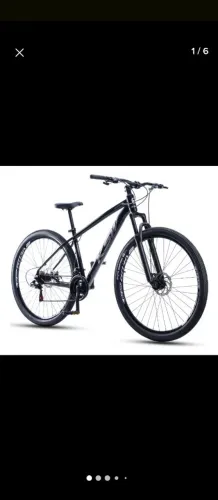 Bicicleta aro 29" quadro 17 alumínio cambio Shimano freio a disco