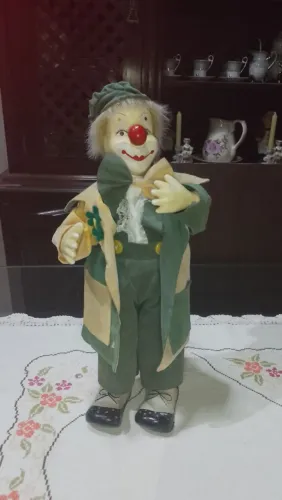 Palhaço de porcelana músical a corda