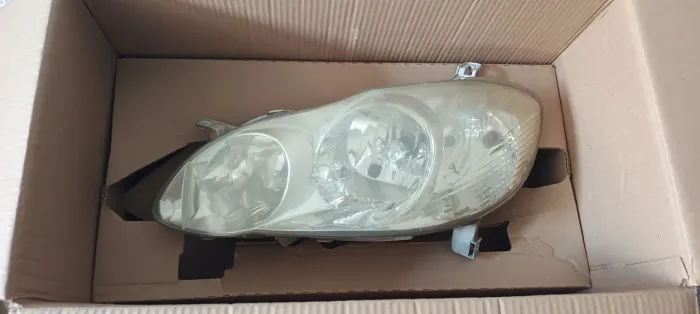 Par farol Corolla 2003 a 2008 original