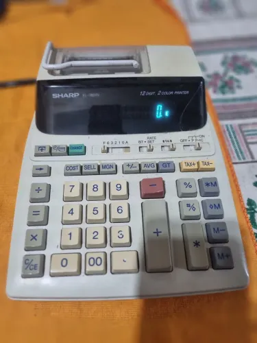 Calculadora de mesa sharp 