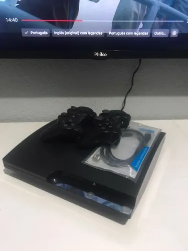 PS3 Slim 500GB + 2 controles