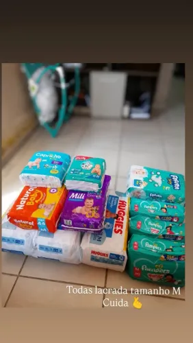 Fraldas Todas lacrada Tamanho (M) Troco por tamanho G 