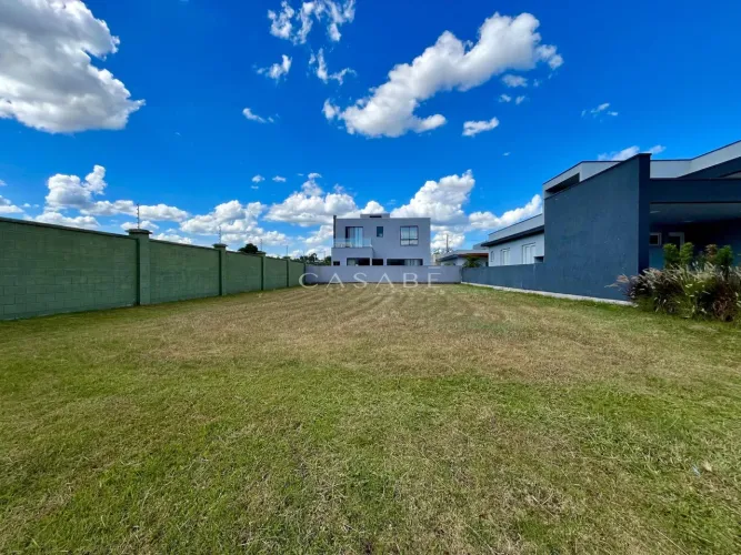 Terreno plano dentro de condomínio fechado Terras Alpha em Gravataí