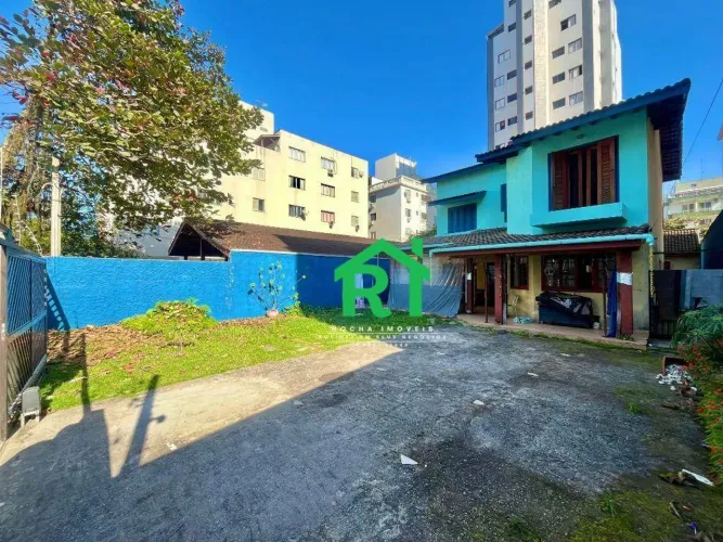 Casa na Praia das Astúrias I 3 Quartos (1 Suíte) I 4 Vagas I Rocha Imóveis Guarujá.