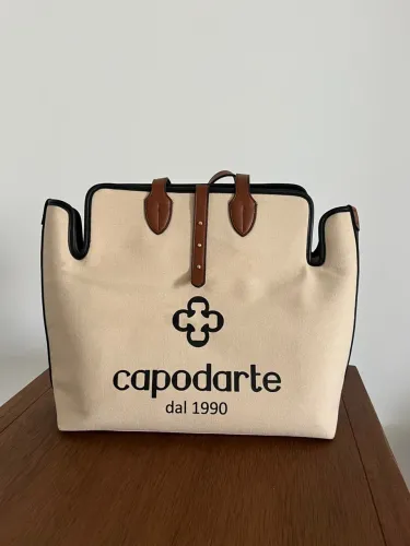 Bolsa Capodarte. Lona e couro.