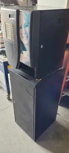 Maquina de café quebrada para tirar pesas