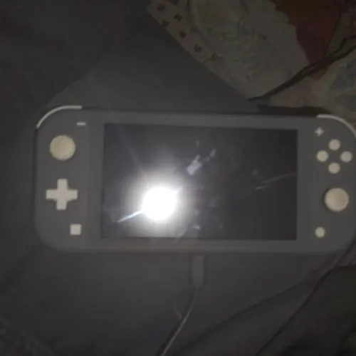 Vendo Nintendo switch lite novo desbloqueado (5 meses de uso) com a caixa ainda