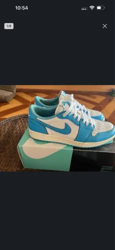 Tênis Jordan 1 unc 