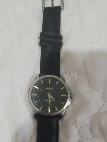 Vendo lindo relógio Orient bem conservado e funcionando perfeitamente 