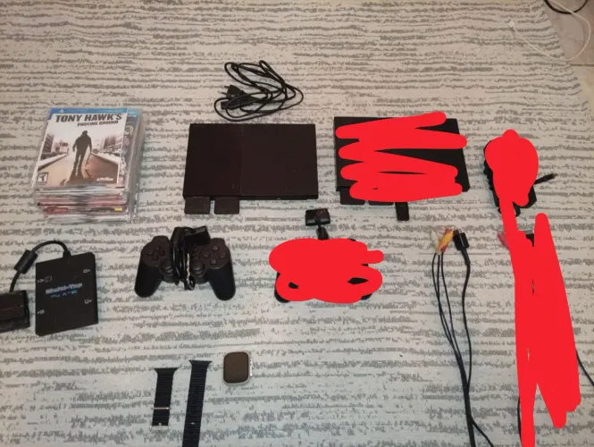 PlayStation 2 com controle + adaptador para 4 controles + 51 jogos