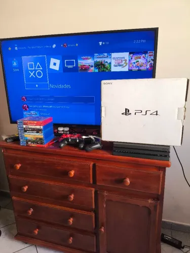 Playstation 4 PRO 1TB com caixa + 11 jogos mídia física